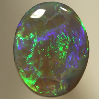 SOLID SEMI BLACK OPAL Very bright forest green over purple. SEE VIDEO